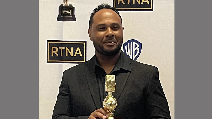 Aaron Day receiving his award.