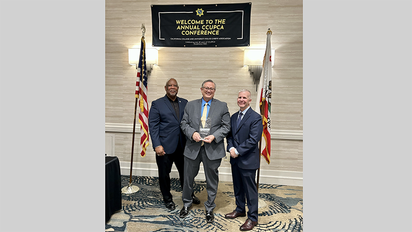 Chief Johnnie Adams receiving the Award of Distinction from the California College and University Police Chiefs' Association (CCUPCA)