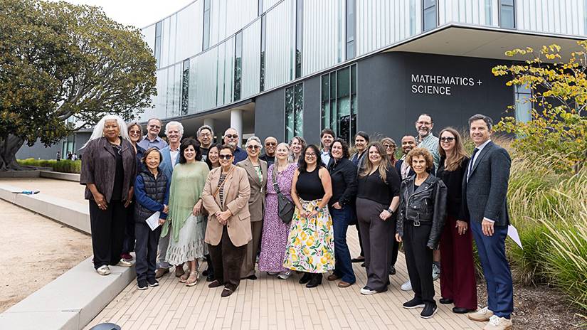 Trustees, senior leadership, and faculty celebrate the new building