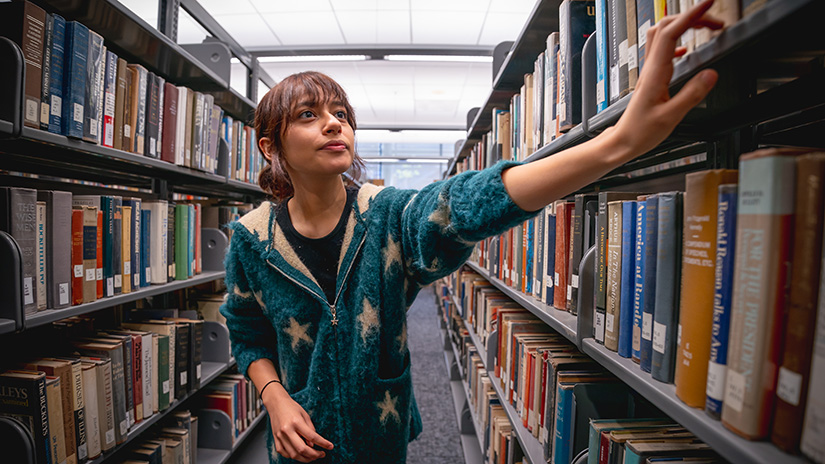 Selecting a book from the stacks