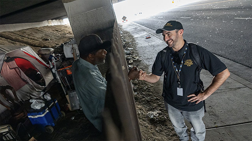 A frontline homeless services worker in action