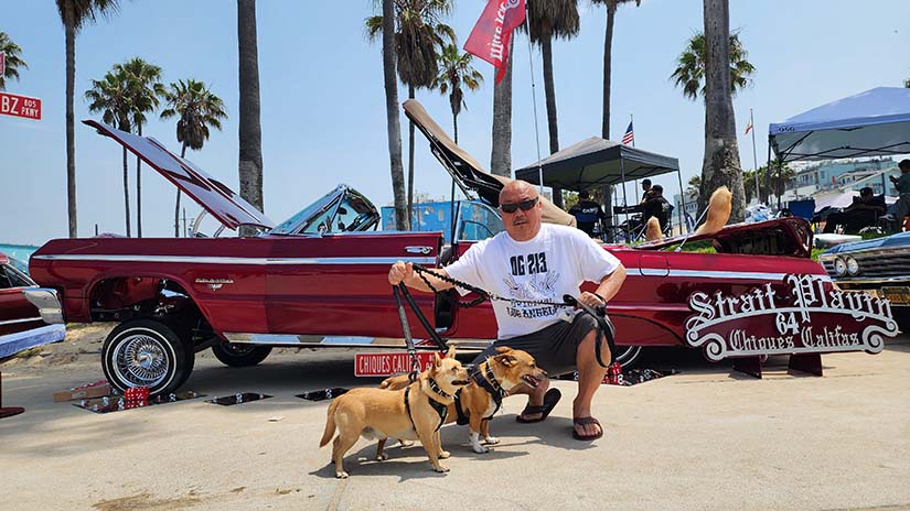 Terry with pups Riley and Monchito at the beach