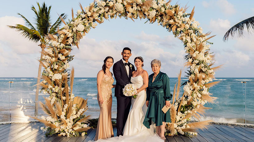 Tania and her mom at her daughter Melanie's wedding, with son-in-law Julio Rodriguez, circa 2023 at her daughter's wedding