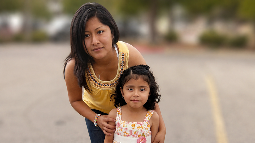 Mia as a child with her mom