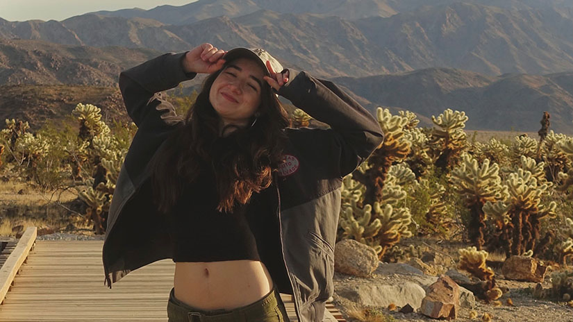 Isabella exploring Joshua Tree Cholla Cactus Garden on a roadtrip