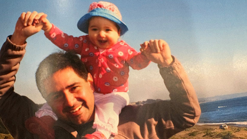 Isabella as a baby hanging out with her father in Chile